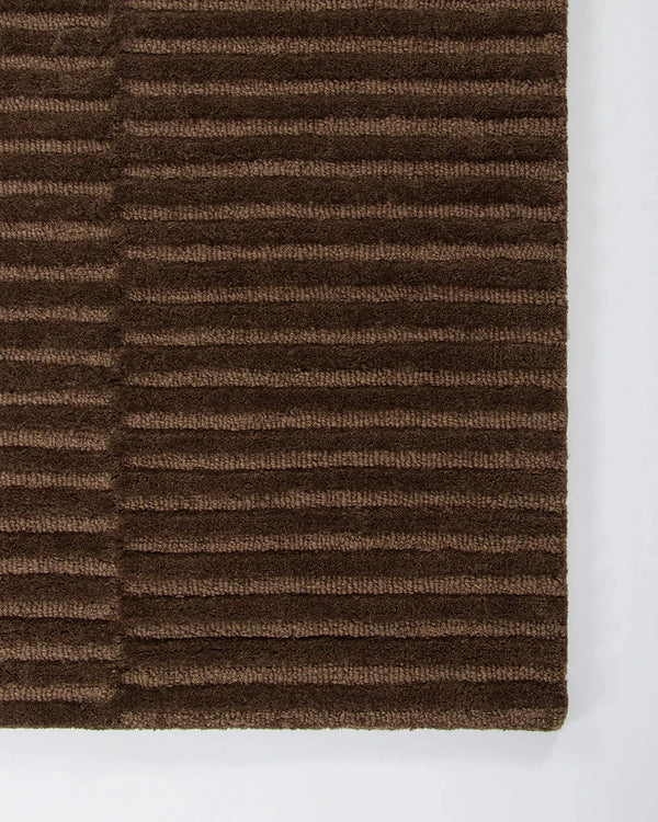 Baya Anni Floor Rug in chocolate with textured cut and looped wool pile design