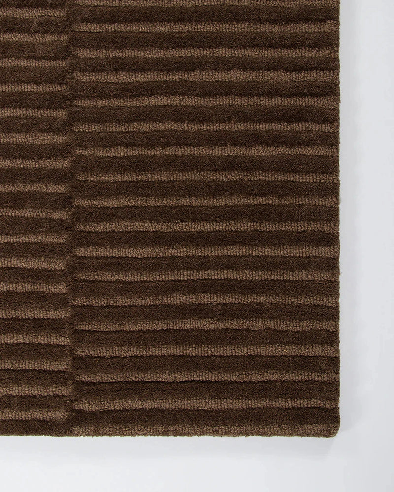 Baya Anni Floor Rug in chocolate with textured cut and looped wool pile design