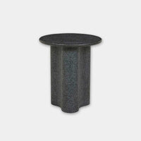 Black speckle Globe West Artie Outdoor Wave Side Table in fibrestone with wave-shaped base