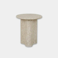 Globe West Artie Outdoor Wave Side Table in warm sand fibrestone with wave design and round top
