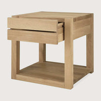 Natural oak Ethnicraft Azur bedside table with one drawer and open lower shelf, made from solid European oak.