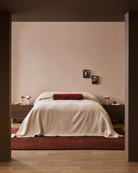 Baya Bastion Floor Rug - Claret styled in a room