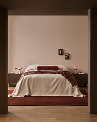 Baya Bastion Floor Rug - Claret styled in a room
