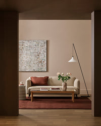 Baya Bastion Floor Rug - Claret styled in a room