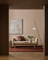 Baya Bastion Floor Rug - Claret styled in a room
