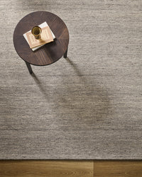 Baya Fairmont Floor Rug - Ash styled in a room