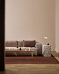 Baya Linden Floor Rug - Brick styled in a room