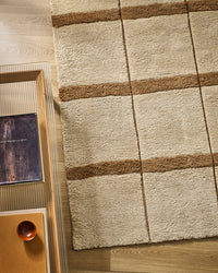 Baya Mesa Floor Rug - Camel styled in a room