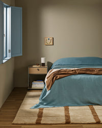 Baya Mesa Floor Rug - Camel styled in a room