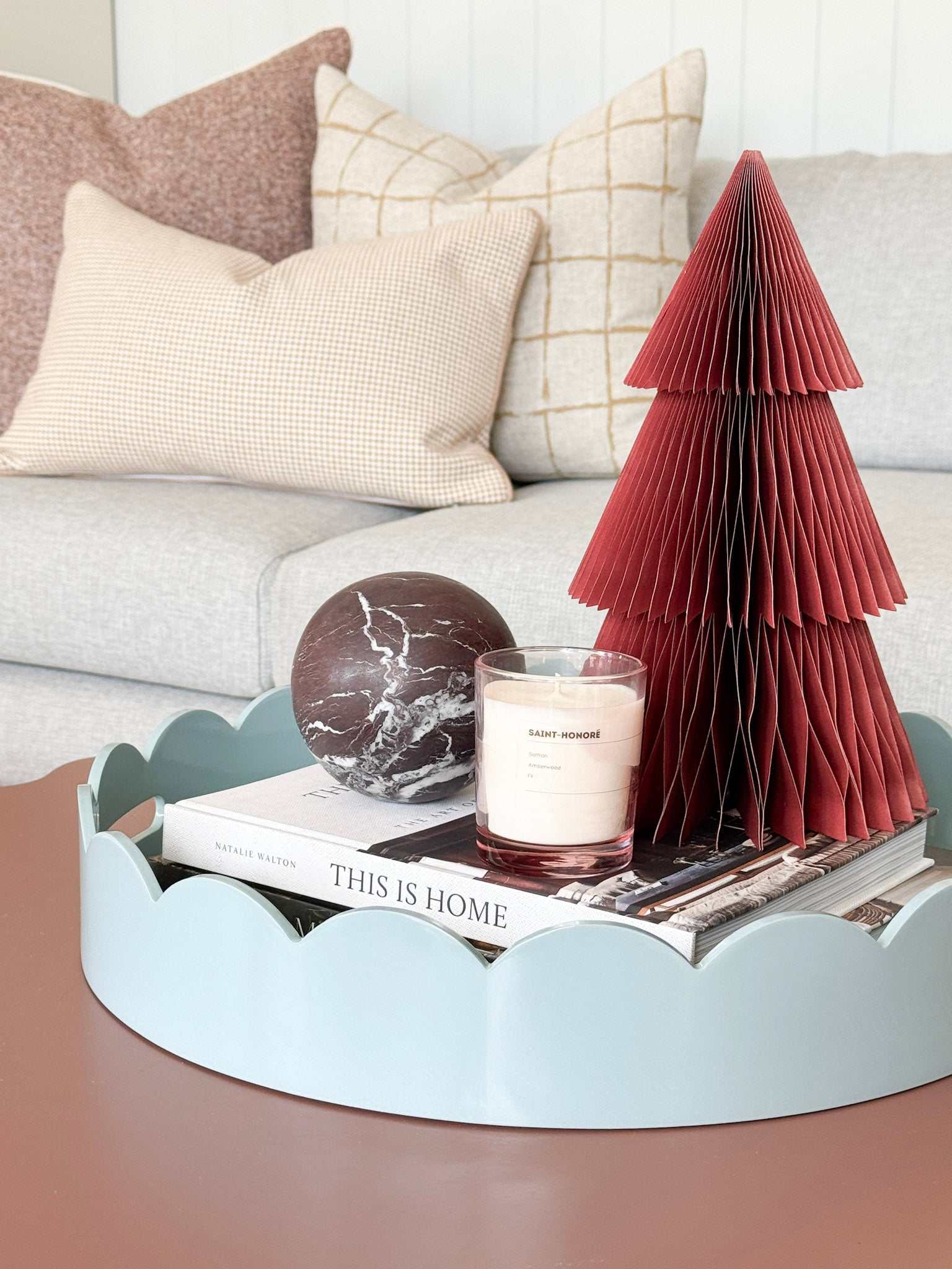 Duck egg blue norsu Studio Round Scalloped Tray with decorative items on table