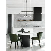 Benjamin Ripple Marble Dining Table with matt black ripple motif base and white Carrara marble top in a modern kitchen setting