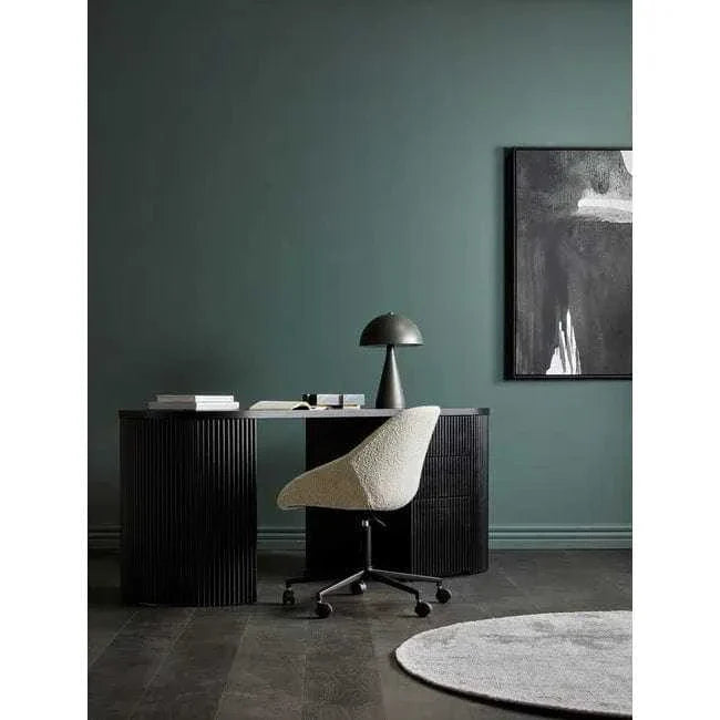 GlobeWest Tepih Neptune round dove grey rug in modern office setting with dark desk and textured chair