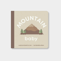 Mountain Baby book by Danielle Wilson with mountain and trees illustration, durable board book for ages 0-4