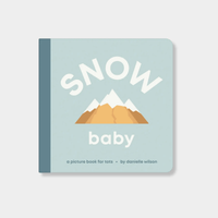 Cover of the Snow Baby board book for toddlers featuring mountain illustration and bold text on a light blue background.