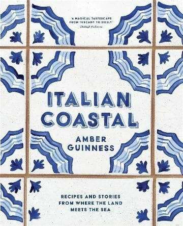 Italian Coastal cookbook by Amber Guinness with blue and white tile design cover featuring Mediterranean recipe and travel stories
