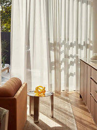 Hand-loomed Chelsea Rug in camel color, 100% wool, showcasing warm, minimalist elegance and durable texture