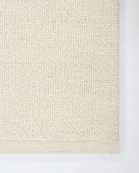 Baya Clifton Floor Rug in ivory with handcrafted 100% New Zealand wool looped pile and flat edge finish