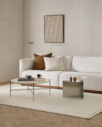 Ivory Baya Clifton Floor Rug with looped pile texture in a modern living room setting