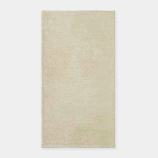 GlobeWest Bower Frame Rug in cloud color, handwoven 100% wool indoor area rug with simple silhouette.