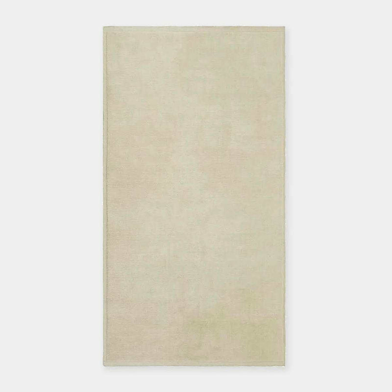 GlobeWest Bower Frame Rug in cloud color, handwoven 100% wool indoor area rug with simple silhouette.