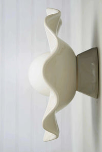 Robert Gordon Pearl Wall Sconce white ceramic with wavy clay design and globe light