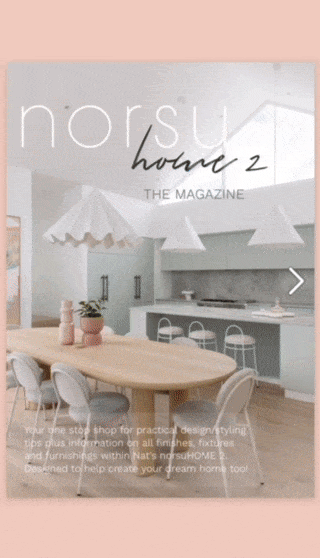Digital magazine cover of norsuHOME 2 featuring a modern kitchen with a wooden dining table and chairs under white pendant lights