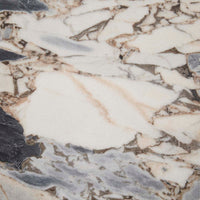 GlobeWest Oberon Curve Marble Coffee Table - Matt Ocean Marble, Natural Ash, styled in a room setting
