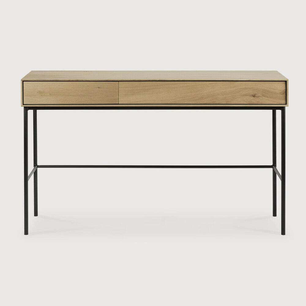 Ethnicraft Whitebird Console in natural oak with black metal legs and two soft-close drawers, designed as a versatile desk or console table.