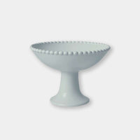 Eden Pedestal Bowl in blue ceramic with beaded rim and pedestal base for elegant fruit display or centerpiece