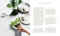 The Beauty Chef Gut Guide book by Carla Oates with fresh greens and meal plans for gut health