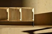 Ethnicraft Oak Stairs Sideboard - 3 Doors, styled in a room setting