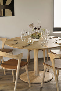 Ethnicraft Oak Torsion Dining Table, styled in a room setting