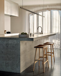 Ethnicraft Osso stool - Natural Oak/ Cognac Leather, styled in a room setting