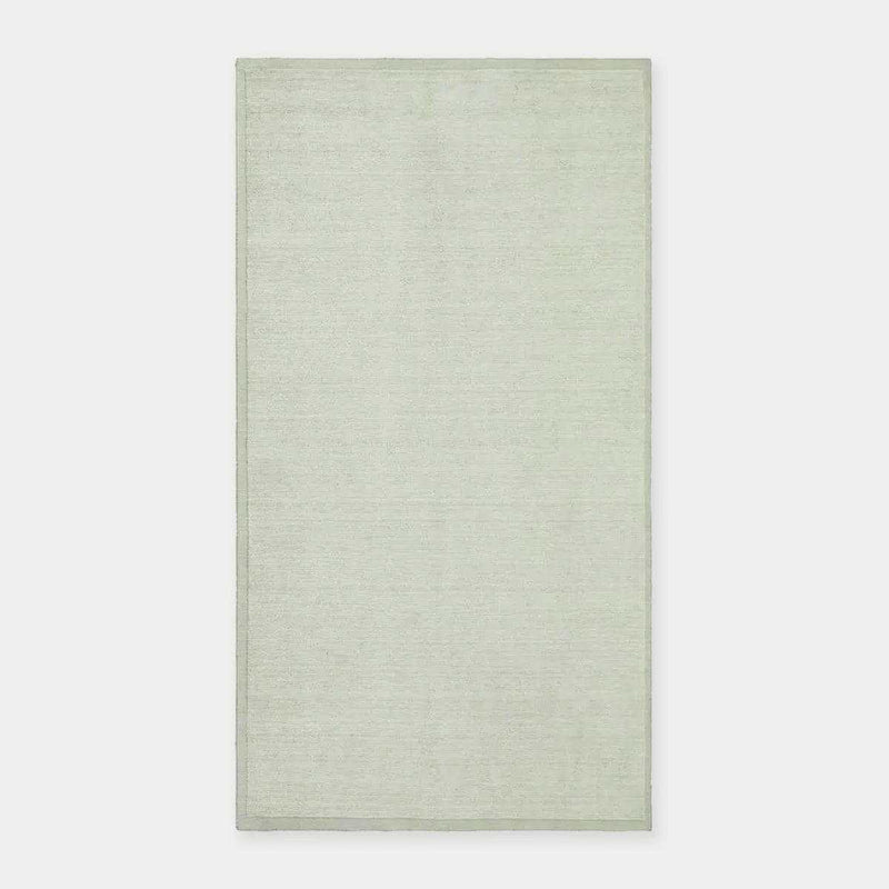 GlobeWest Bower Frame Rug in seafoam, hand-woven 100% wool indoor area rug with simple frame design