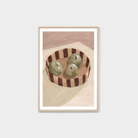 Middle of Nowhere Fruit Bowl print with three green apples in a striped bowl framed in oak with white border