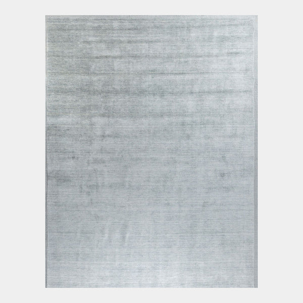 GlobeWest Bower Frame Rug in Seaside Blue, deep-etched on grey