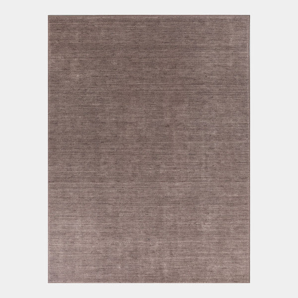 GlobeWest Bower Nora Rug in Cocoa, deep-etched on grey