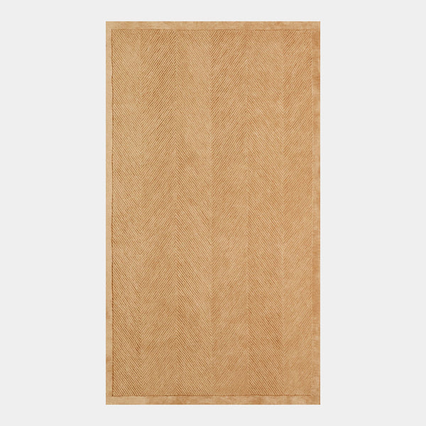 GlobeWest Tepih Eira Rug in Sepia, deep-etched on grey