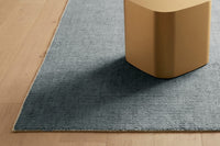GlobeWest Tepih Neptune Rug - Ocean Green, styled in a room setting