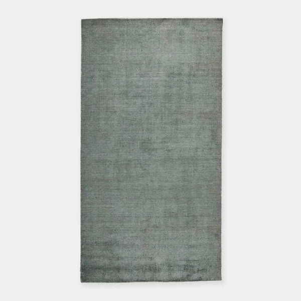 GlobeWest Tepih Neptune rug in ocean green, hand-loomed wool, silk, and cotton blend, indoor area rug with rustic texture