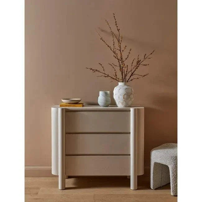 GlobeWest Artie Dresser in powder blue with sculptural pillar legs and rounded fronts, featuring three smooth-glide drawers and shadow-line handles.