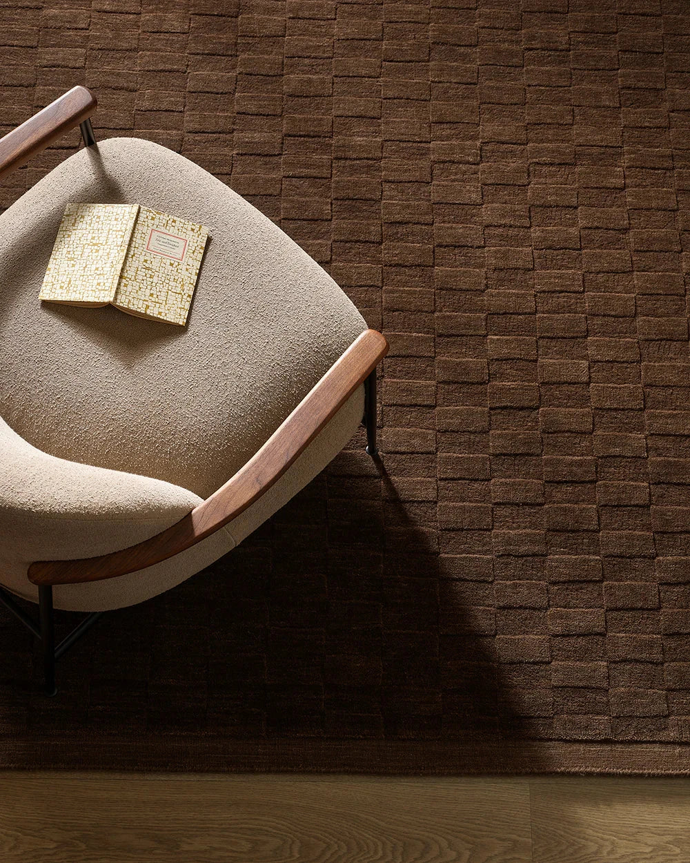 Baya Hugo Floor Rug in espresso color with hand-carved checkerboard design made of 100% New Zealand wool