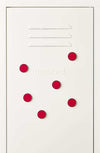 Set of six red Mustard Made The Buttons magnets on white surface