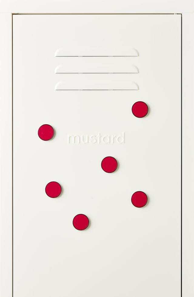 Set of six red Mustard Made The Buttons magnets on white surface