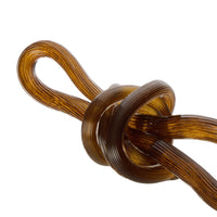 Knot Glass Sculpture deep brown, close-up of the knot