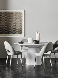 GlobeWest Livorno Round Dining Table (Indoor/Outdoor) - White Speckle, styled in a room setting