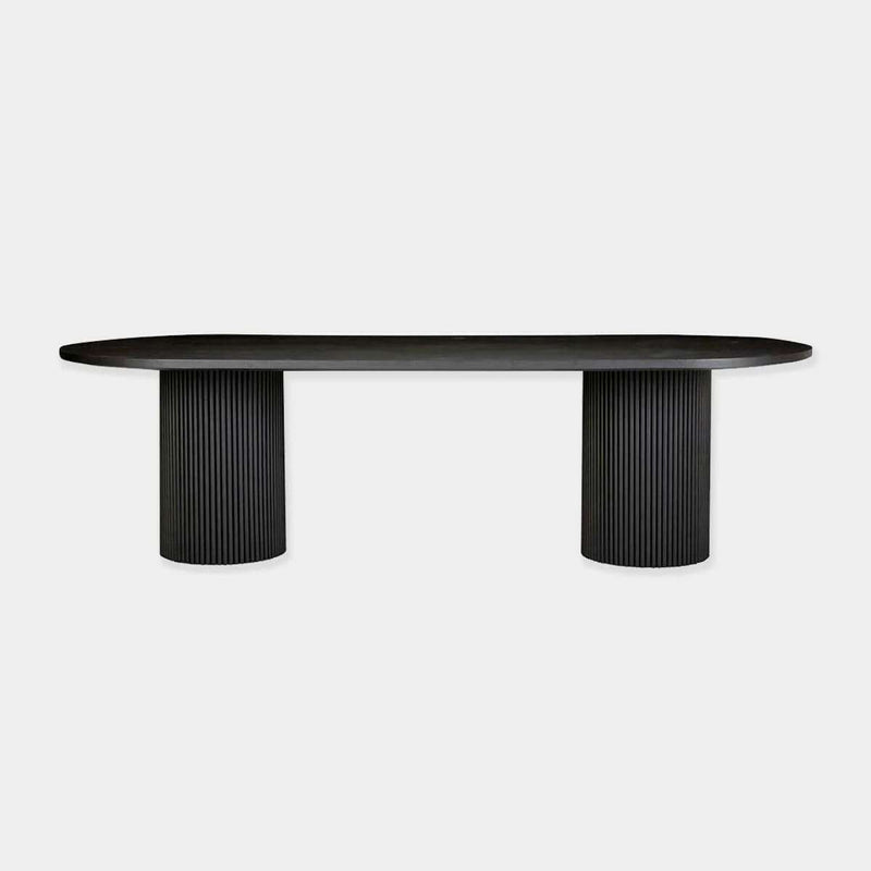 Black Globe West Benjamin Ripple Oval Dining Table with rippled pillar bases and timber ash veneer top