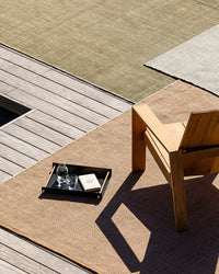Baya Lonsdale Outdoor Rug - Cumin styled outdoors
