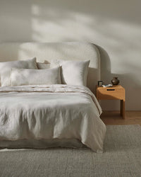 Bedroom styled with Weave Home Sova Savanna linen bedding and a timber bedside