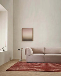 Baya Marlow Floor Rug in wine color with burgundy and pale pink stripes in a modern living room setting